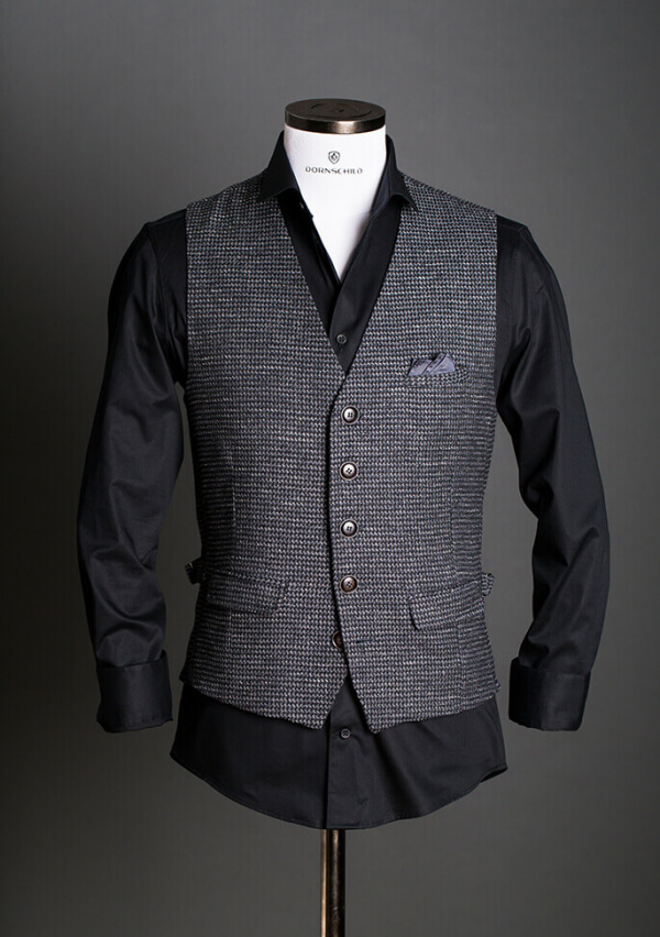 DORNSCHILD - der unterste Knopf einer Weste bleibt immer offen ...