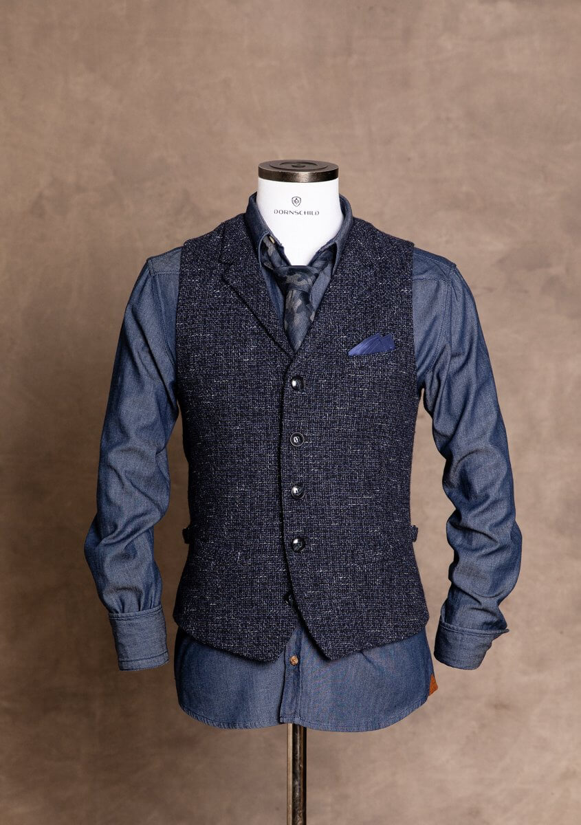Dark blue premium men's vest gilet from DORNSCHILD with subtle blue gray pattern and collar for a classy and smart style.